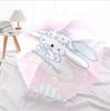 Portable travel umbrella with cute Sanrio character designs, UV-protective folding umbrella.