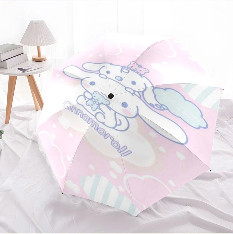 Portable travel umbrella with cute Sanrio character designs, UV-protective folding umbrella.