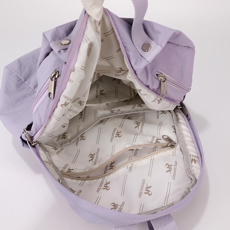 Lightweight Nylon Backpack with Side Zipper Pockets Top Handle Casual Daypack for Women Daily Commute Travel