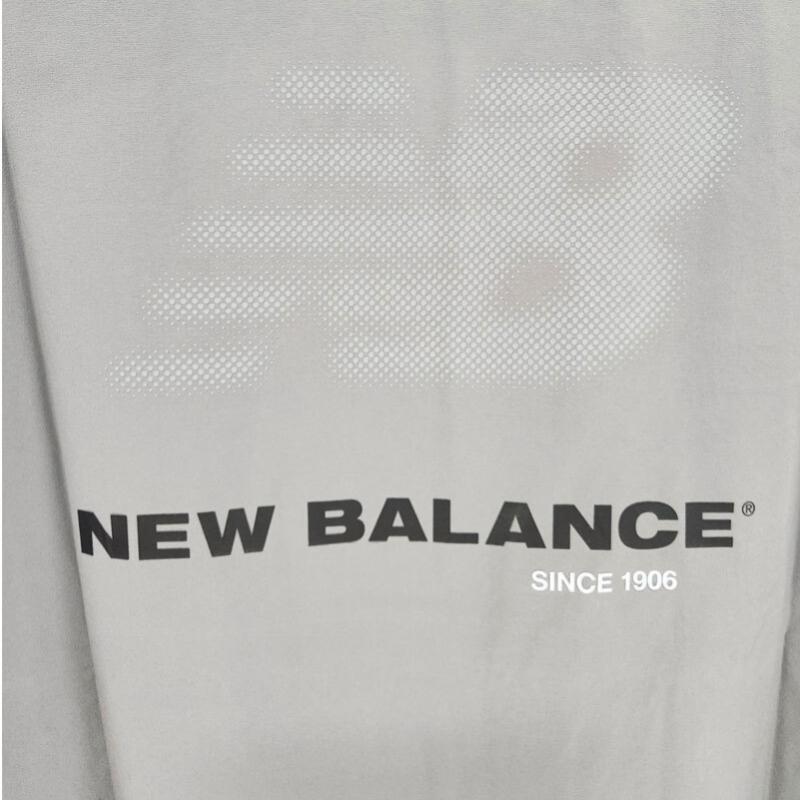 New Balance Men Frozen Essential Woven Tee Charcoal Nbneg31623