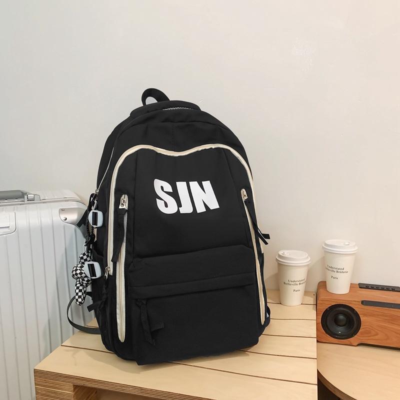 Schoolbag Japanese simple and fashionable backpack 1011 summer new middle school schoolbag college student college style alphabet backpack