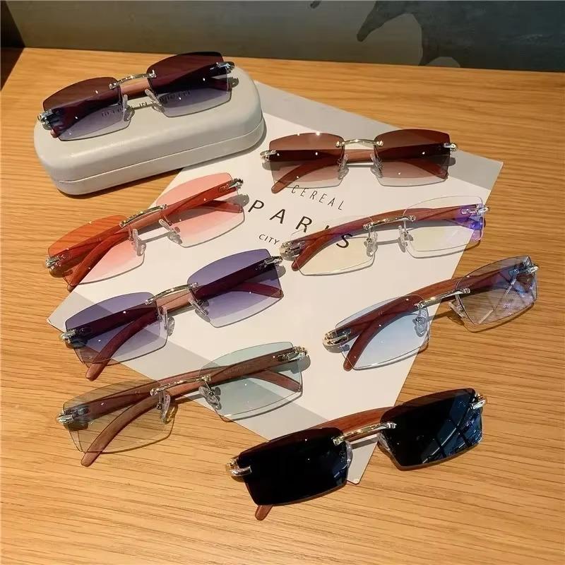 Occhiali da sole senza montatura per uomo donna modello in legno marchio di lusso occhiali da sole retrò tonalità moda UV400 viaggi all'aperto