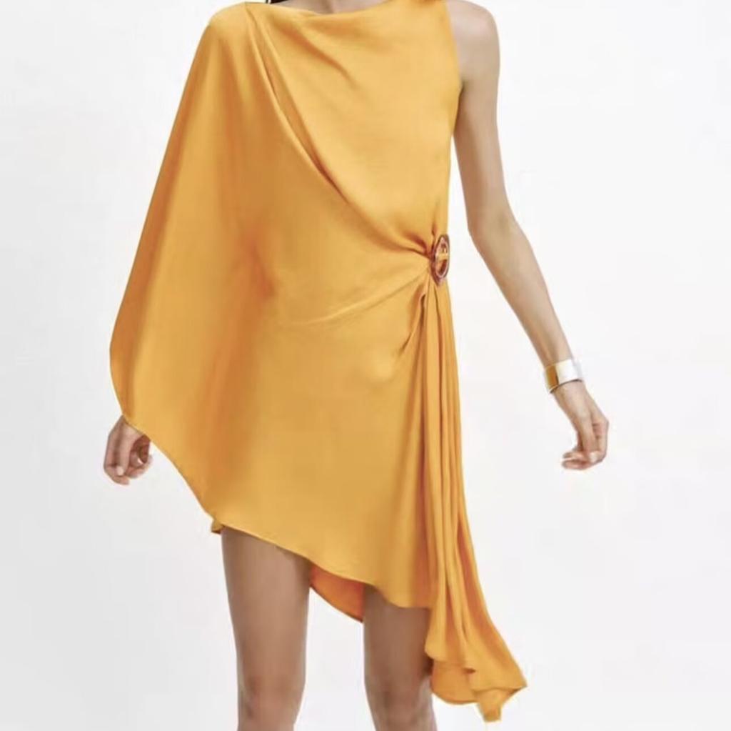 European and American summer new French retro fashion temperament round neck buckle irregular dress