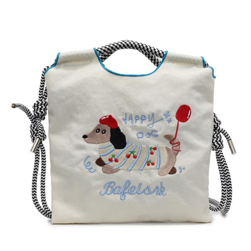 Embroidery cute dachshund dog bucket bag women's new mobile phone bag versatile commuter shoulder messenger bag