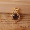 Elegant Amethyst Christmas Hat Pendant with Gold Diamond Inlay - Women's Clavicle Chain