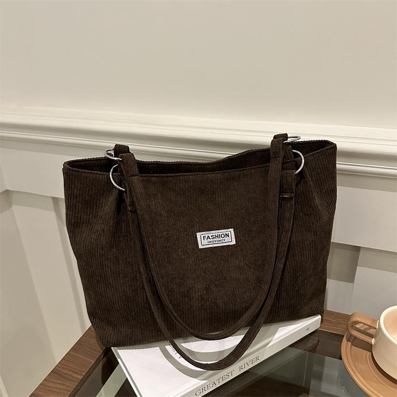 Corduroy bag women's large capacity 2025 new autumn and winter versatile casual shoulder shopping bag commuter tote bag