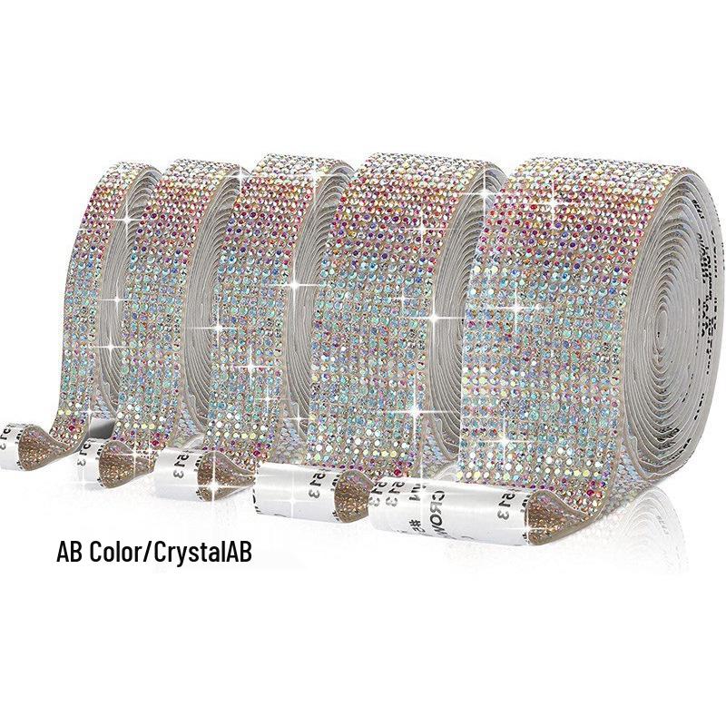 

Самоклеящаяся белая стразовая полоса для одежды, обуви, сумок и DIY аксессуаров 2 rows (approx. 0.4 cm wide)