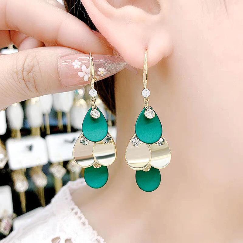 Fashion Geometric Bow Flower Pearl Earrings Women'S Premium Versatile Small Fragrant Wind Earrings