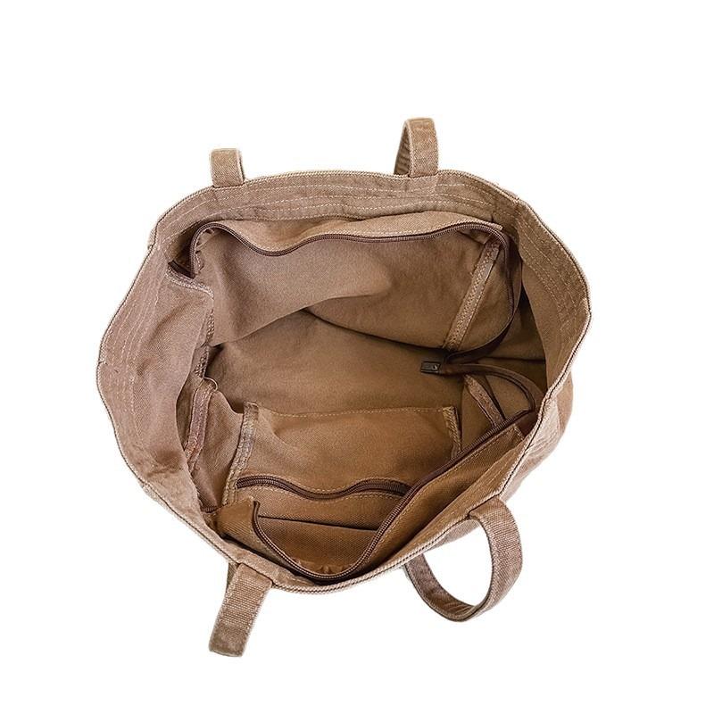 Lazy wind canvas bag, new large-capacity commuter tote bag, casual versatile shoulder bag, portable shopping bag.