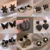 Exquisite Classical Black Butterfly Earrings for Women Girls Fashion Hollow Sweet Cool Stud Earrings Wedding Party Jewelry Gifts