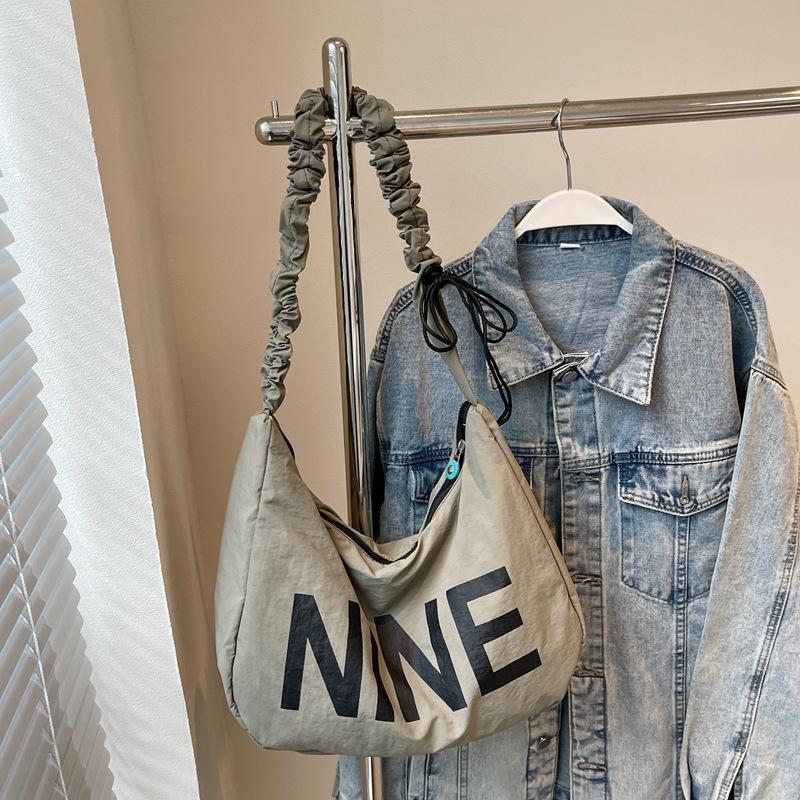 

2025 new Korean version Harajuku shoulder bag female Mori simple letter backpack casual fashion temperament crossbody backpack Small зелёный