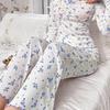 Dam pyjamas och byxor med lång ärm och blommigt tryck