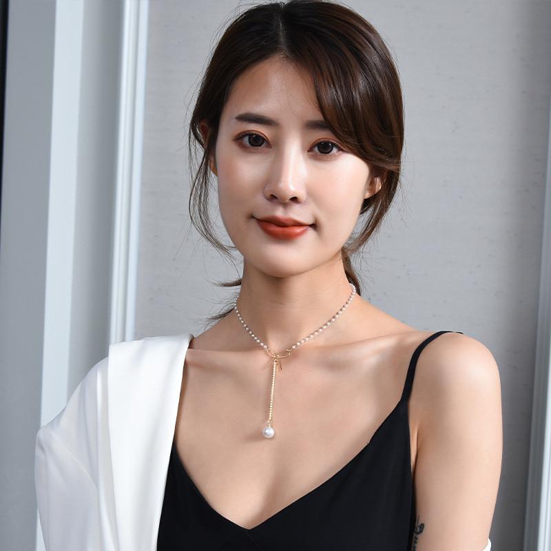 Elegant Butterfly Knot Pearl Necklace For Women In Trendy Korean Style With Unique Design Features