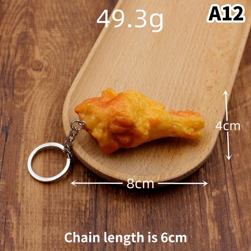 Lustiger gebratener Hühnerbein-Hühnerflügel-Schlüsselanhänger, kreativer Mini-Simulations-Lebensmittel-Anhänger mit Schlüsselring für Handtaschen-Geldbeutel-Zubehör