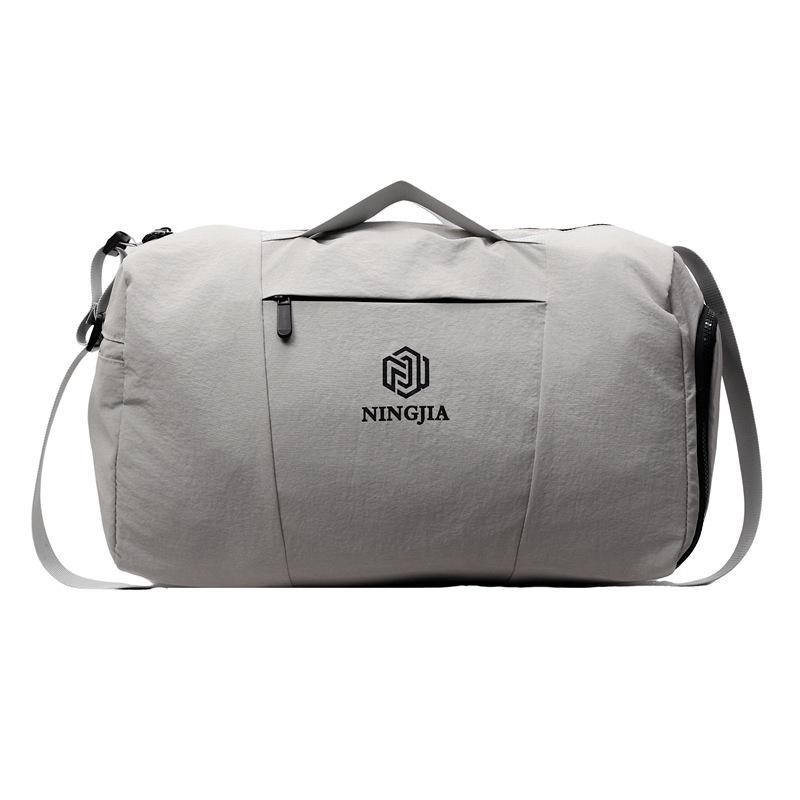 

Большая вместительная портативная дорожная сумка женская новая легкая багажная сумка мужская для коротких деловых поездок сумка для хранения сумка для плавания сумка для фитнеса женская серый