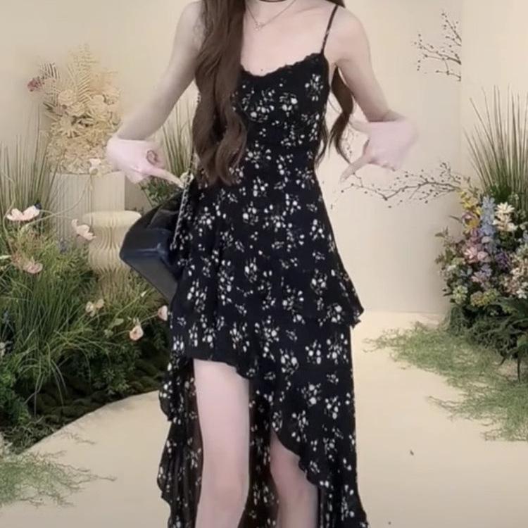 Irregular floral suspender dress for women's spring and summer new waist and thin black lotus leaf edge printed medium and long skirt