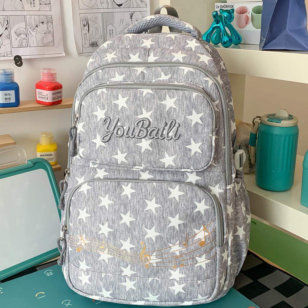 Schoolbag Oat Milk Card Star Galaxy School Bag Female Junior High School Student High Value Fashion College Wind Ridge Reduction Backpack