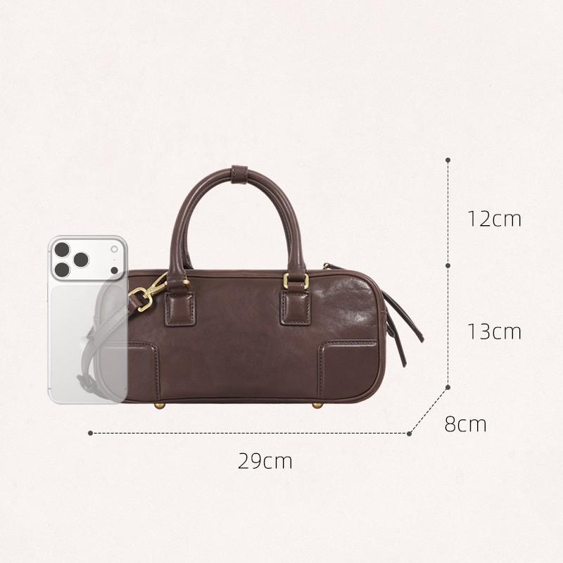 New Vegetable Tanned Leather Pillow Bag Women's Retro Niche Handbag Fashionable High-end Commuter Portable Boston