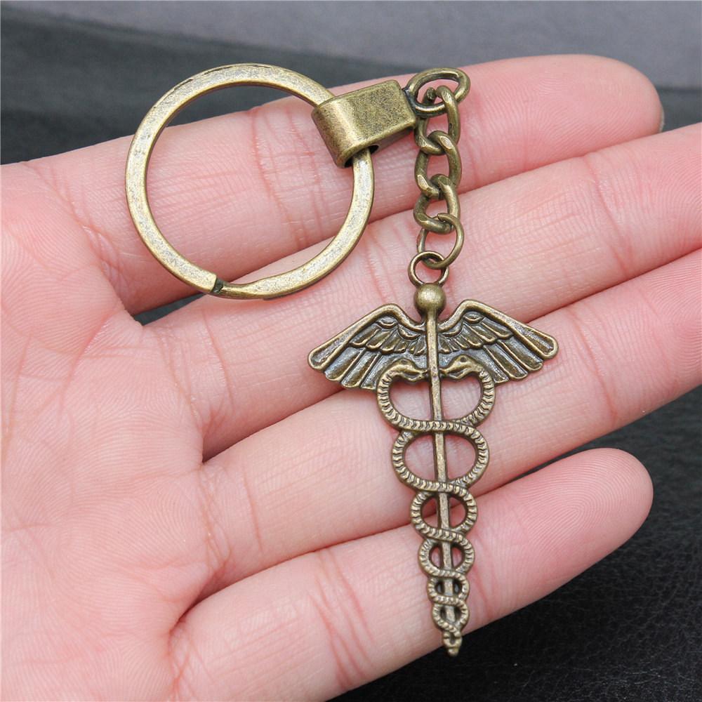 Dinosaur Animal Prehistoric Creature Pendant Antique Bronze Metal Keychain with 30mm Ring for Women High Quality