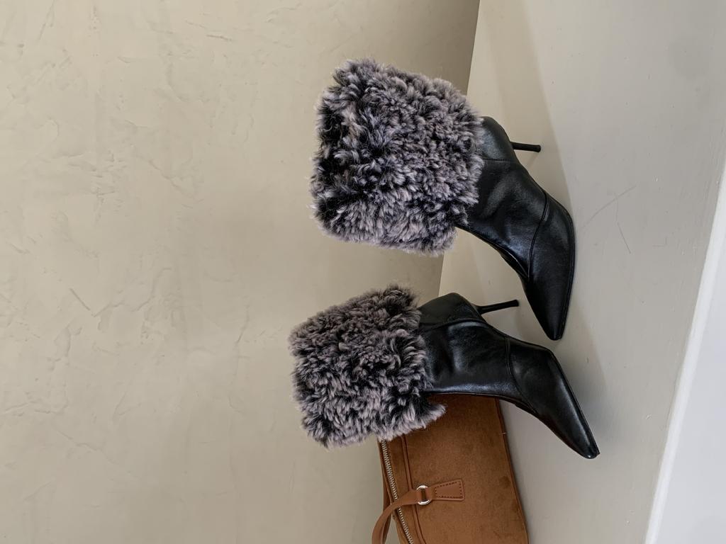 2025 autumn and winter new European and American fluffy high-heeled short boots pointed thin-heeled high-heeled women's boots