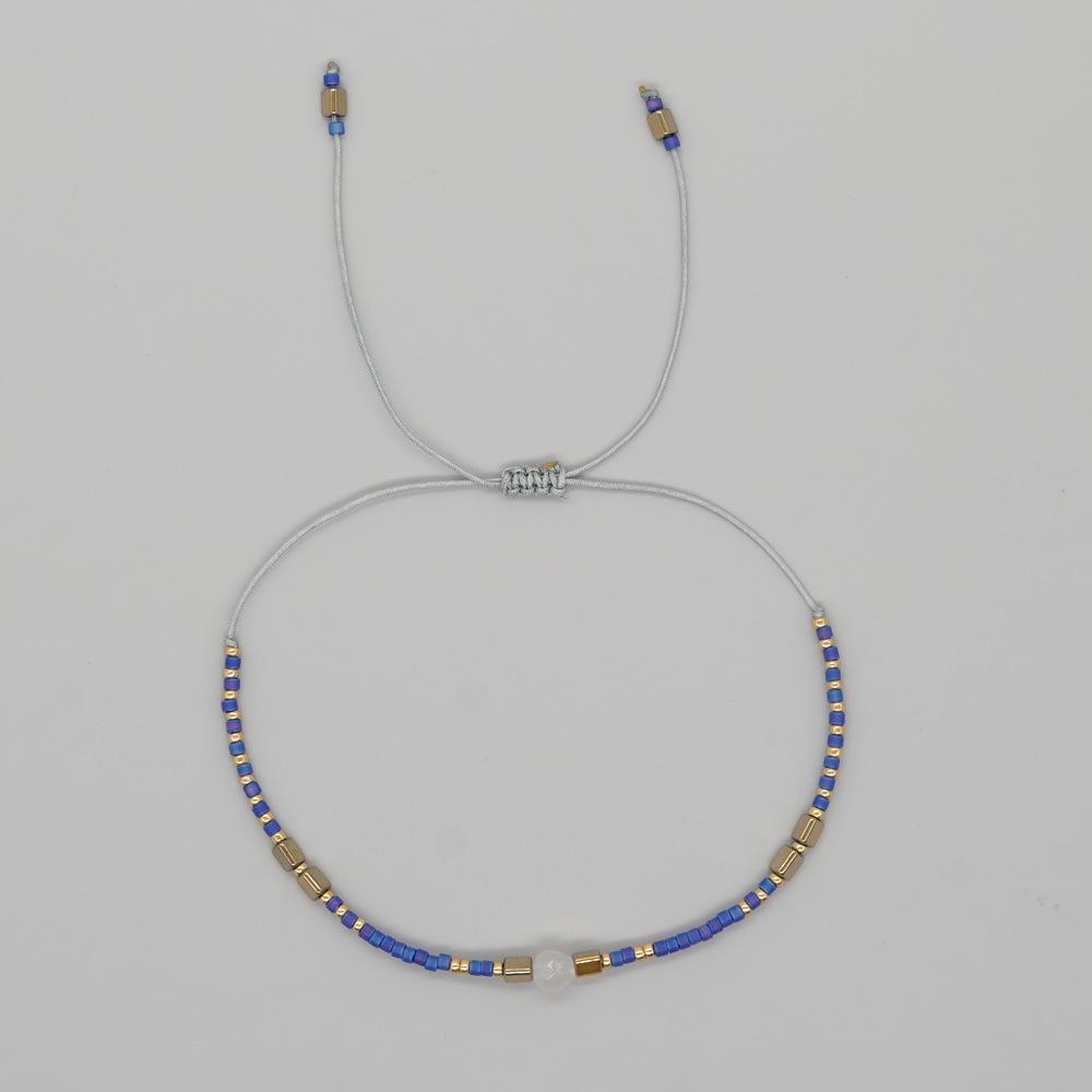 Trendy Deep Blue & Gold Rice Bead Pearl Hand Bracelet: Niche Design Women's Fashion Accessory