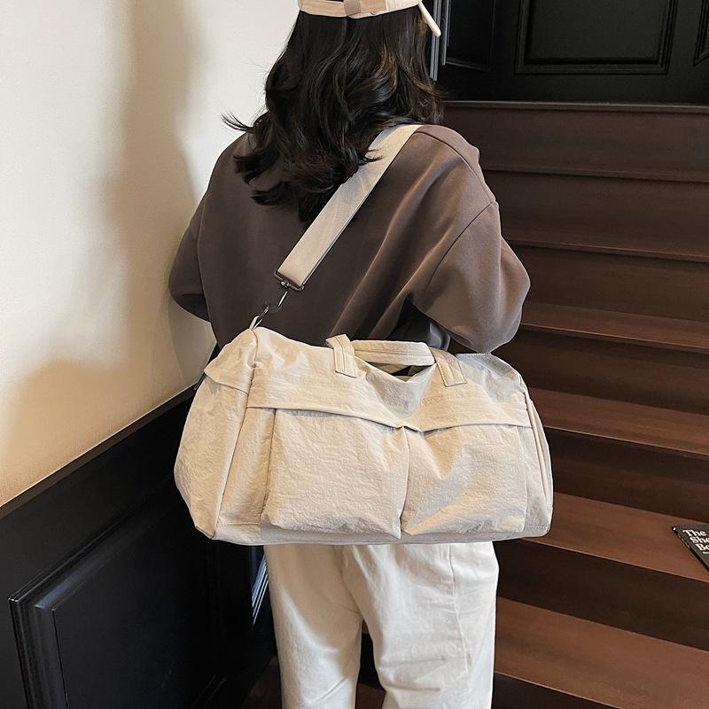 Dry and wet separation sports fitness bag women's nylon cloth waterproof short trip men's portable messenger bag luggage bag