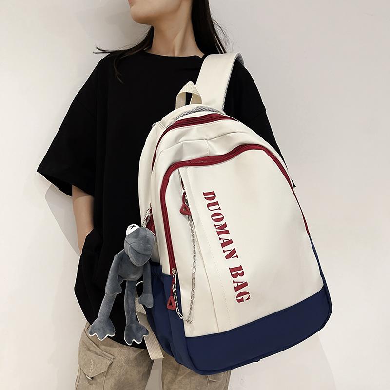 Schoolbag schoolbag 1011 summer new Korean version simple anti-theft contrasting color backpack junior high school college student shoulder back