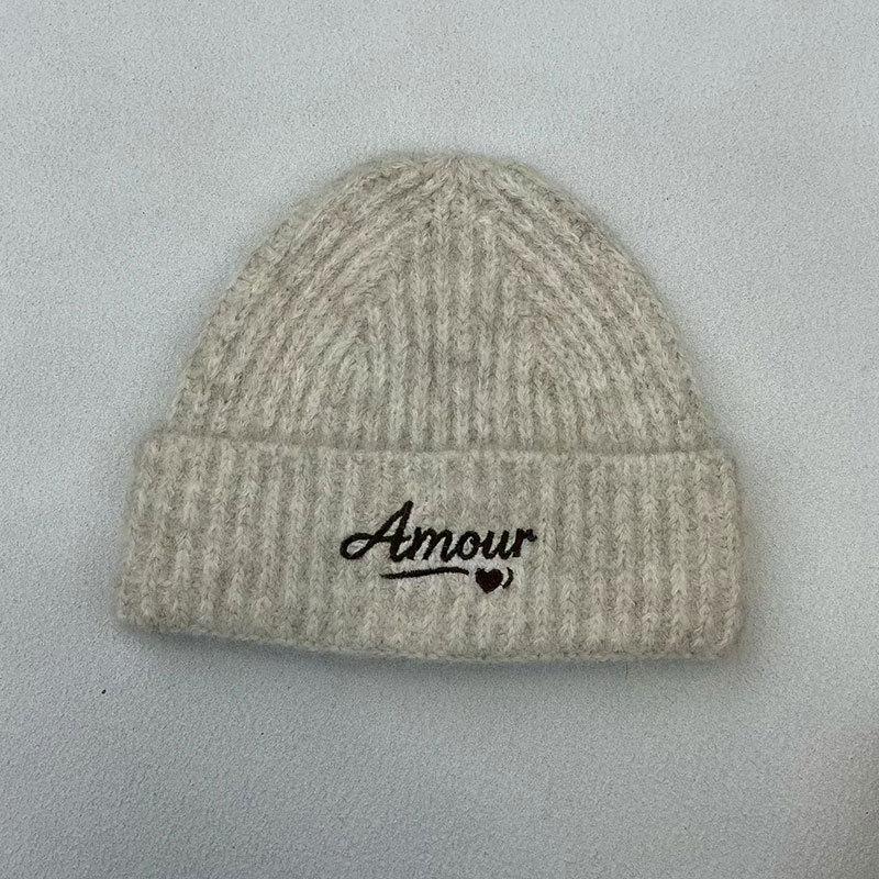 Autumn and winter original new letter embroidery knitted hat to keep warm and show the face, small ear protectors and versatile wool hat