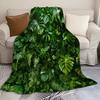 A Luxurious Flannel Blanket Featuring a Tropical Monstera Leaf Pattern, Made from Soft And Warm Digital Printed Non- Polyester.