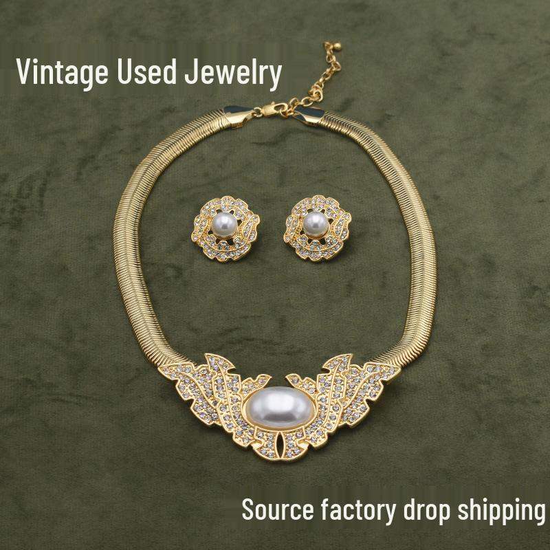 

Vintage Pearl Snake Bone Necklace & Earrings Set