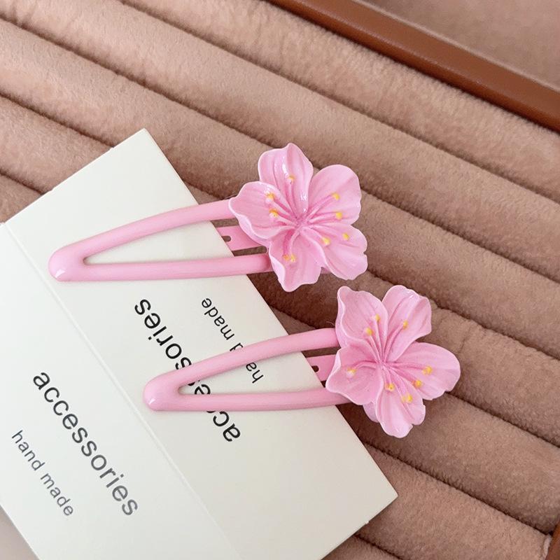 

Кліпса для волосся Плюмерія Принцеса-втікачка - Квіткова бічна прикраса для пляжного та дитячого волосся