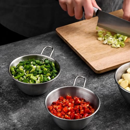 Stainless steel colander and bowl set with handles, perfect for draining rice and other dishes. Also includes a colander and bowl. Perfect for fruit,