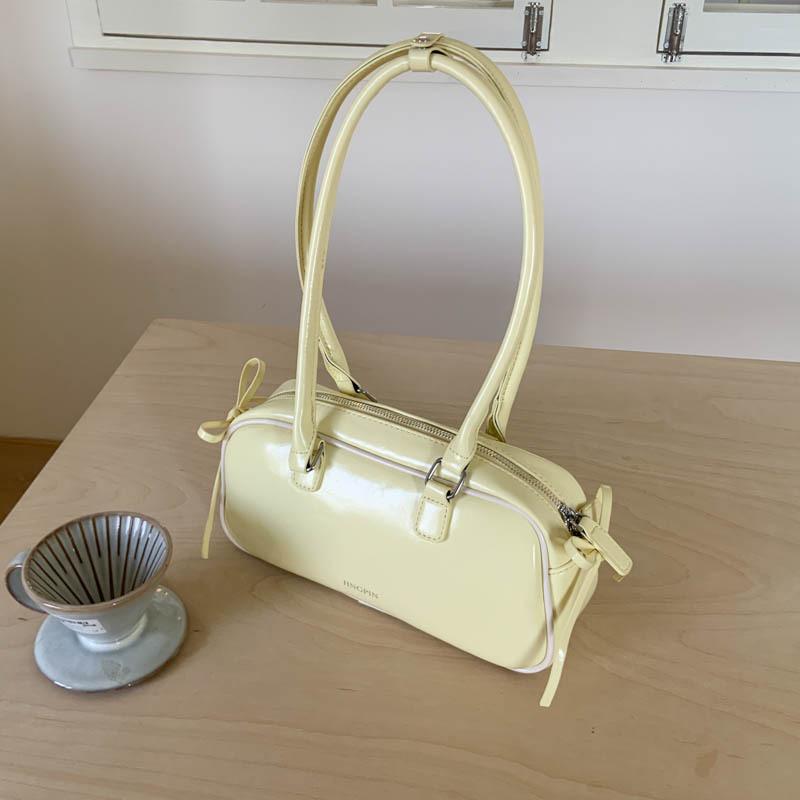 

Niche underarm bowling bag women s 2025 new high-end sense large-capacity commuting shoulder bag, one piece will be sent on behalf of others. жёлтый