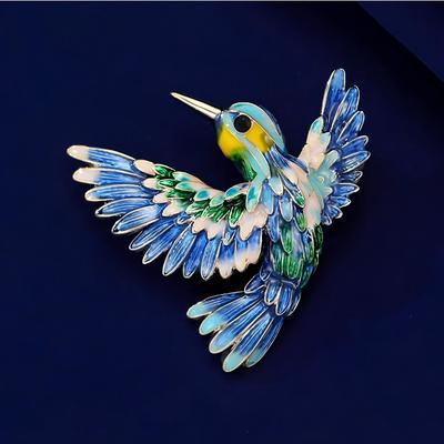 Die Blauringel-Vogel-Brosche ist exquisit und modisch. Die Elster-Brosche ist eine Nischen-Design-Anstecknadel