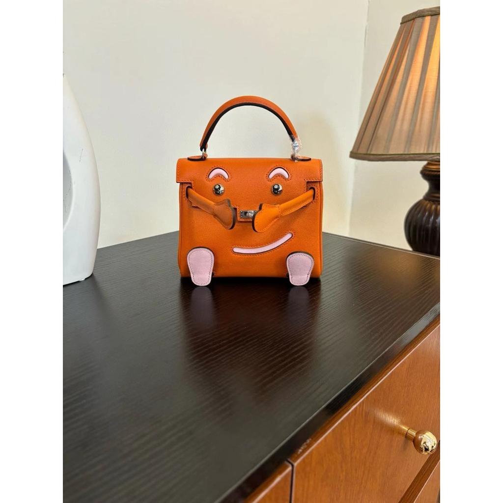 Borsa a faccina sorridente nuova per la primavera e l'estate 2025 borsa Kelli mini in pelle bovina di primo strato di alta gamma borsa a tracolla carina da millenial