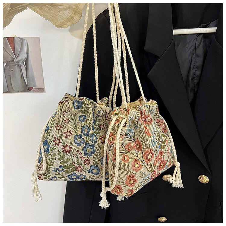Umhängetasche Kordelzug Canvas Damentasche Blumenstickerei Ethno-Stil Kleine Tasche Crossbody Bucket Bag