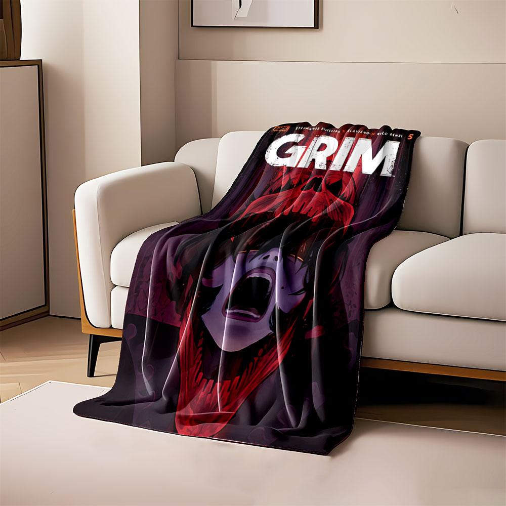 A screaming face framed within a red skull-like shape. for all seasons blanket lunch break throw gift
