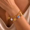 Creative Ocean-Style Stainless Steel Bracelet with Ceramic Coconut Tree and Shell Pendants