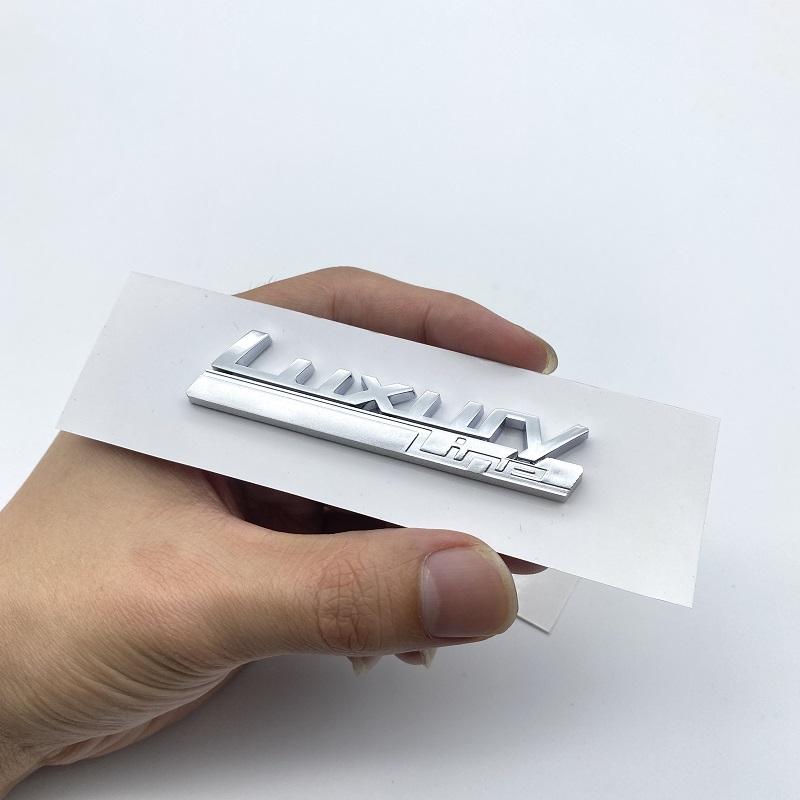 Nový emblém do blatníku Luxury Line Sport Line pro BMW 730 740 750 750Li Boční logo Styl auta Upgrade Nálepka Chrome & Matte