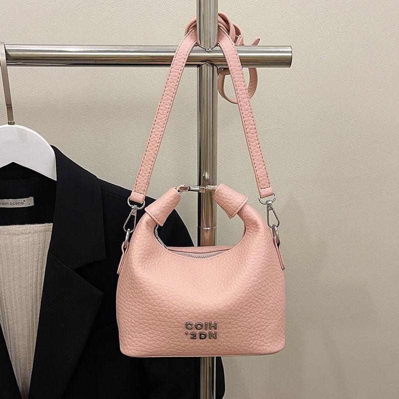 

Wholesale new product niche design temperament fashionable lychee pattern wrist bag foreign style versatile high sense commuter messenger bag