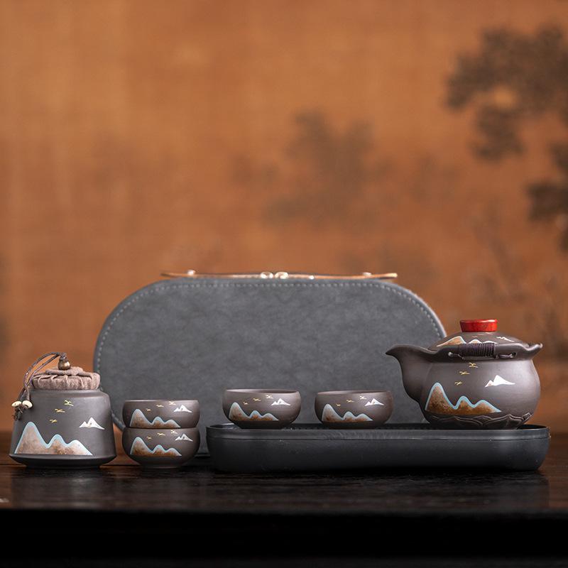 Purple sand hand-held pot travel tea set with tea tray, portable outdoor one pot and four cups of express cup as a gift.