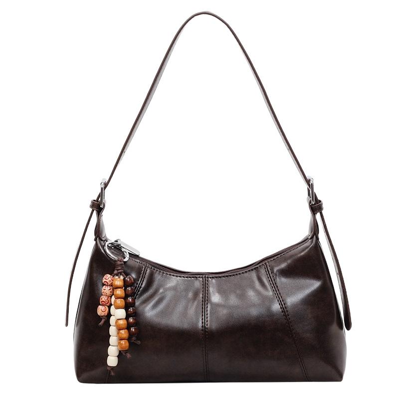 

French simple baguette underarm bag women s 2025 autumn new fashionable textured women s bag single shoulder oblique span bag