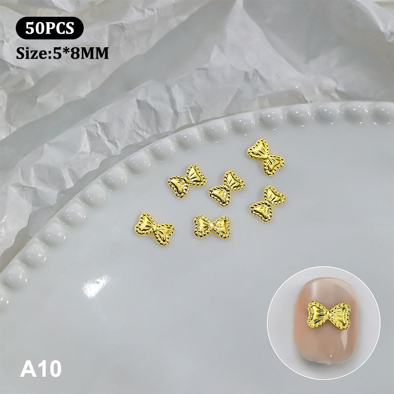 50 st Metalllegering Rosett Naglar Konst Dekoration Silver Guld Nagelberlocker DIY Manikyr Design Smyckestillbehör Verktyg