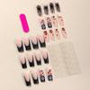Wearable Halloween Nail Art: Long Pipe Nails with Stars, Hearts, Ghosts, and Spider Webs.