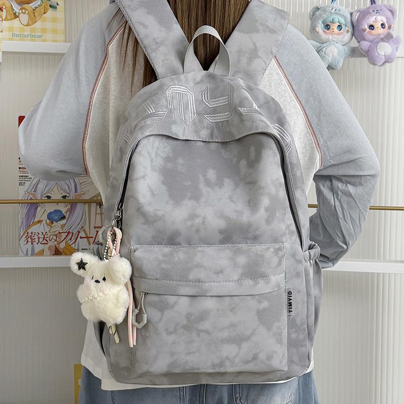 Schoolbag Japanese simple and versatile large-capacity solid color campus schoolbag 1011 summer new light commuter student backpack