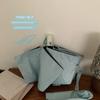 Meet the Sea with This Sea Blue Solid Color Automatic Umbrella. a Stylish and Practical Umbrella with Black Coating for Sun Protection