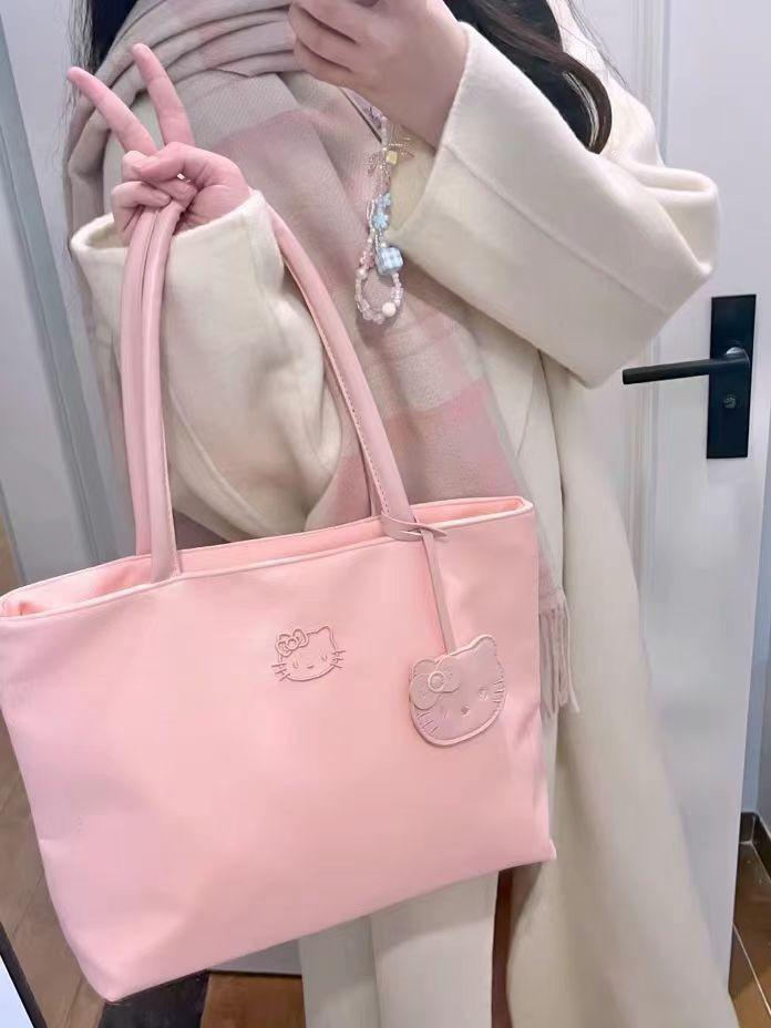 

2025 new cute exquisite large capacity lightweight tote bag kitty embroidered handbag girl heart armpit bag рожевий