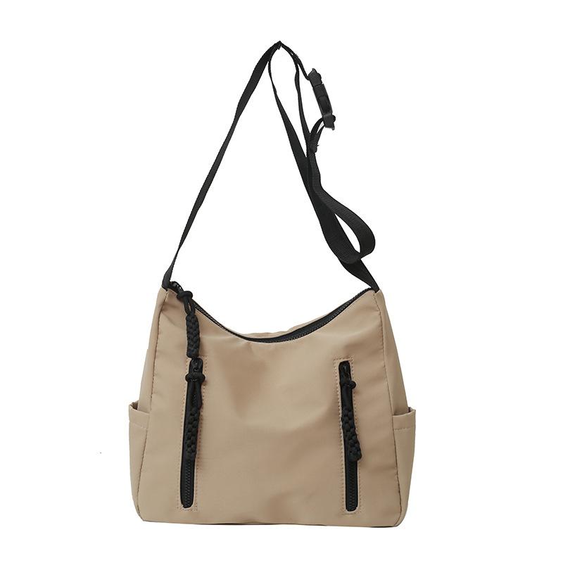 Fashion and leisure large-capacity bags Women's spring and summer new canvas bags Students commute to class Versatile oblique