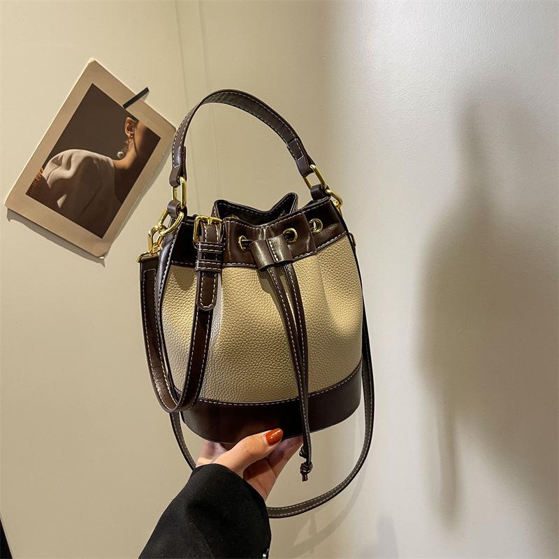 

Сегодняшние популярные нишевые сумки, новые женские сумки, модные универсальные сумки-мессенджеры, сумки-ведра для通勤