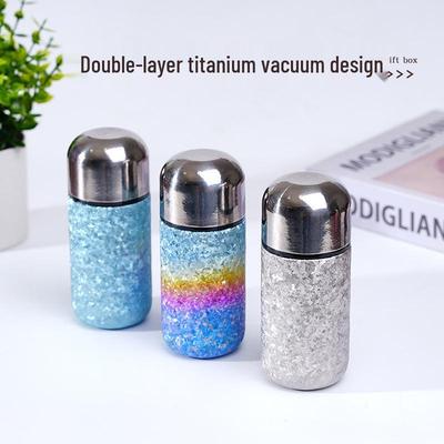 > Sleek Mini Titanium Antibacterial Double-Layer Thermos Cup - Portable, High-Value, Pocket-Sized.